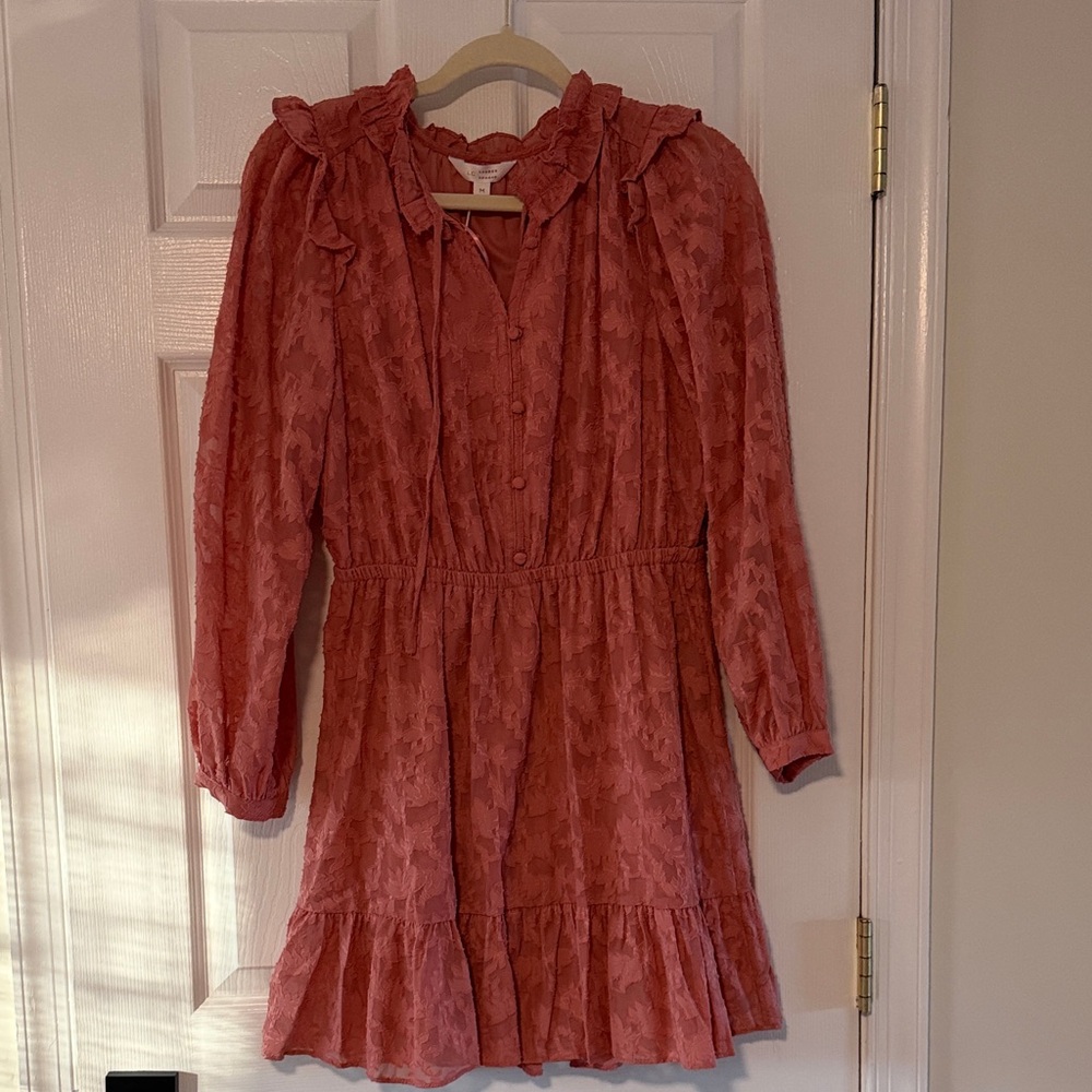 Woman’s Ruffled Pink Dress